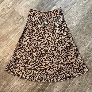 Sienna Sky high low satin leopard skirt